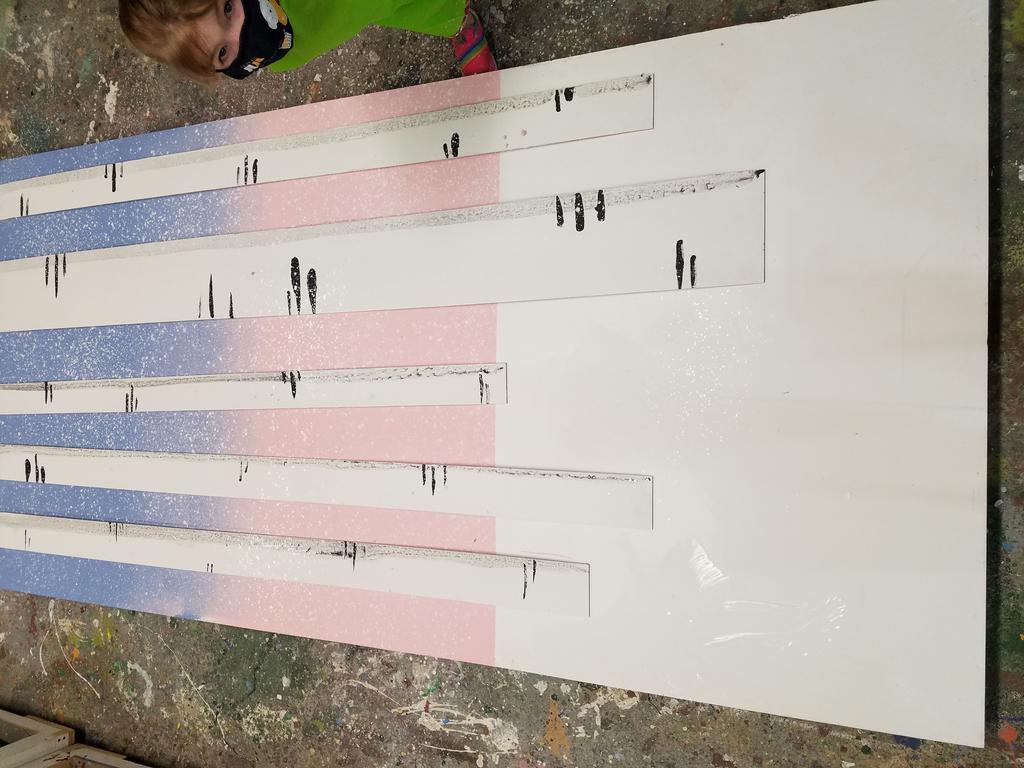 Photo showing completed art project with wintery birch trees.