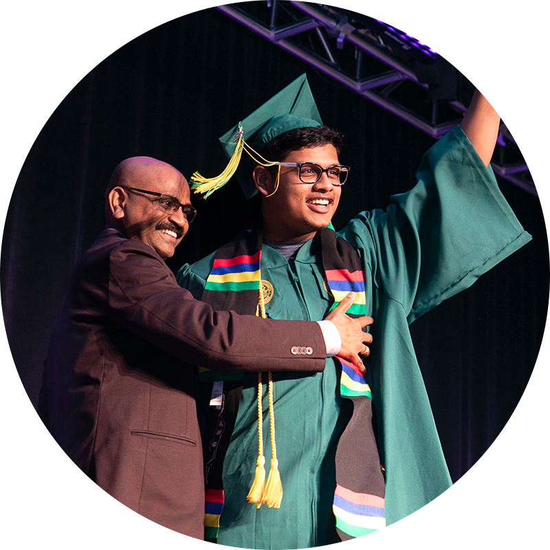 A graduate and his father